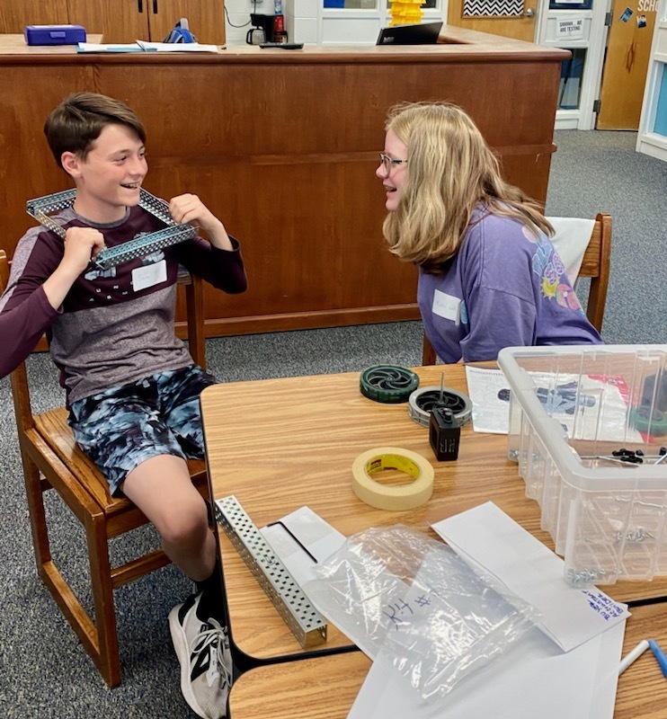 HAL students working together to build a robot