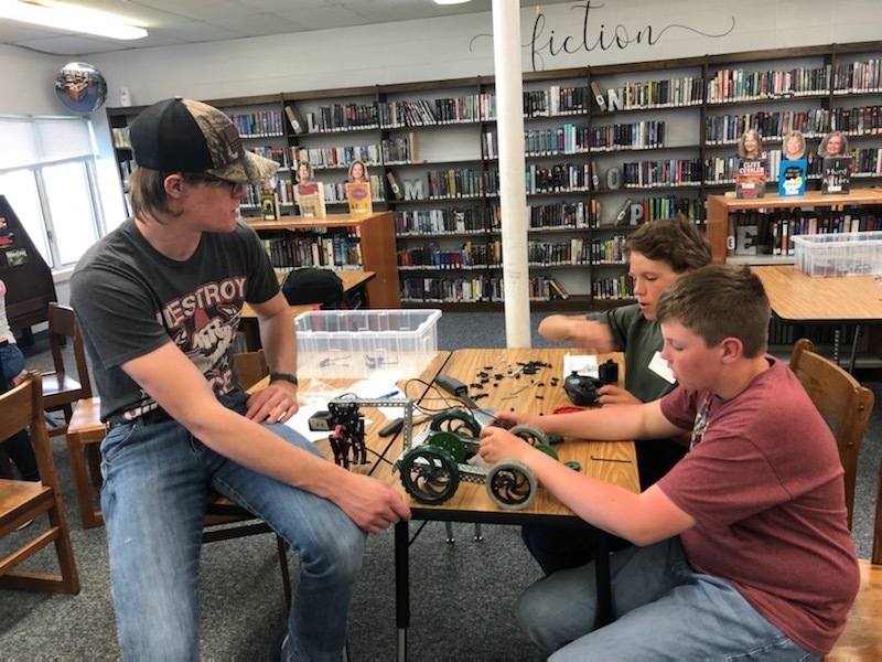 HAL students working together to build a robot